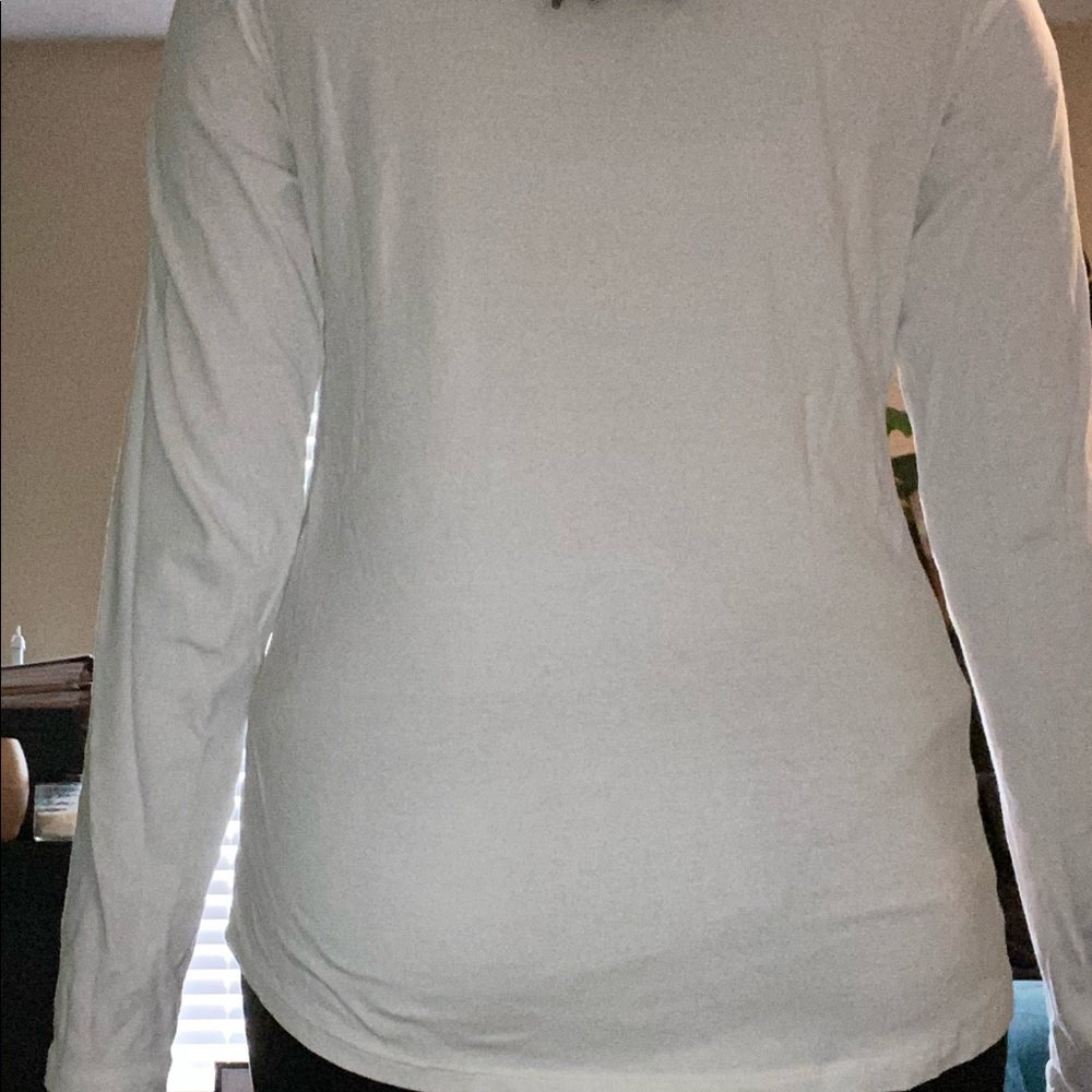 A long sleeve white shirt.